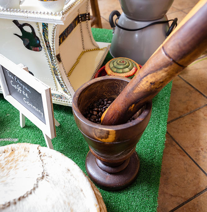 Ethiopian Coffee Grinder and beans - Tiru